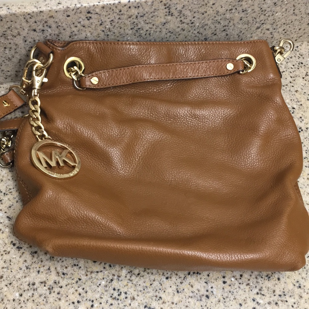 Michael Kors crossbody-leather and gold.